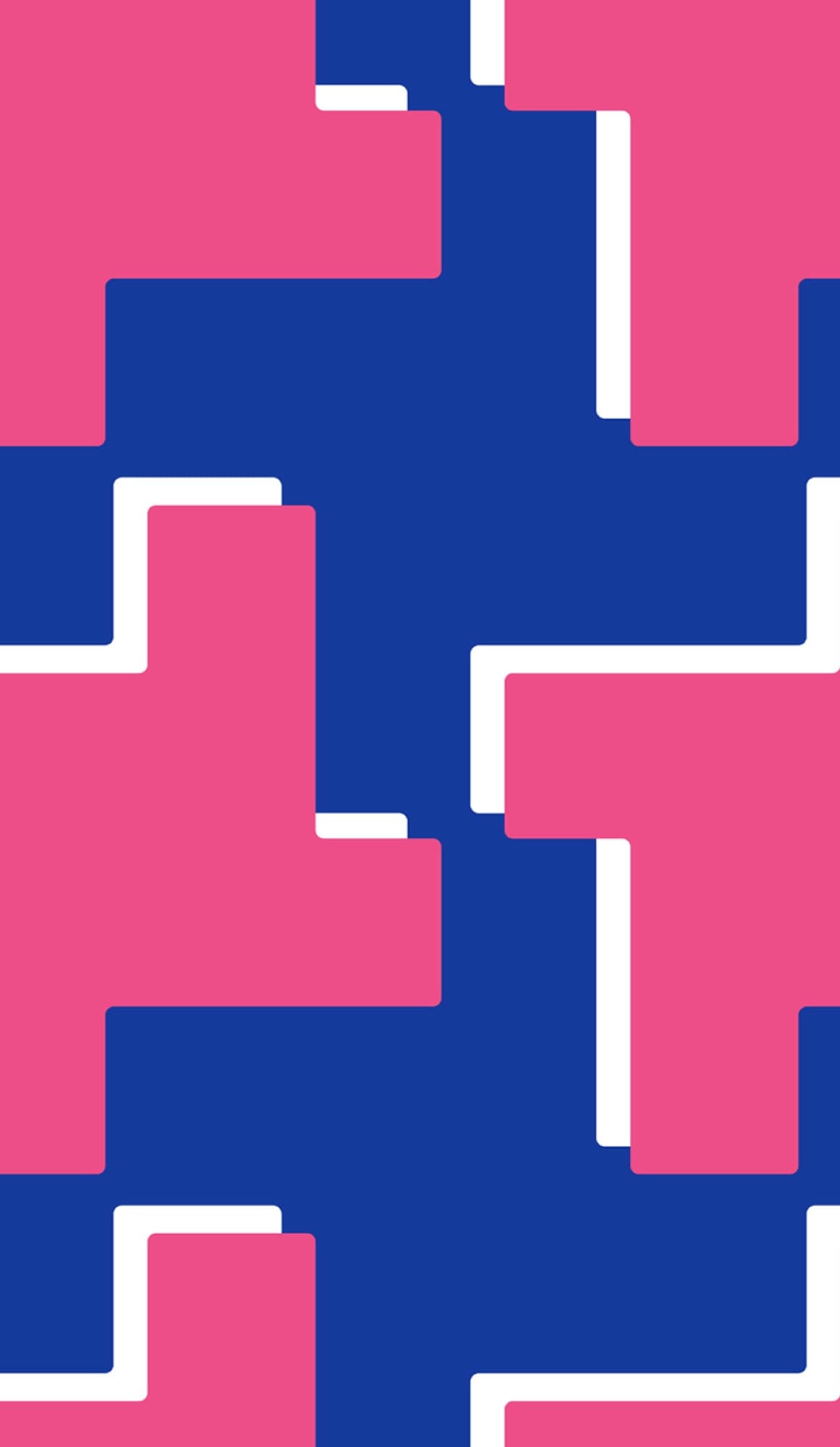 Model in blue and pink geometric print dress