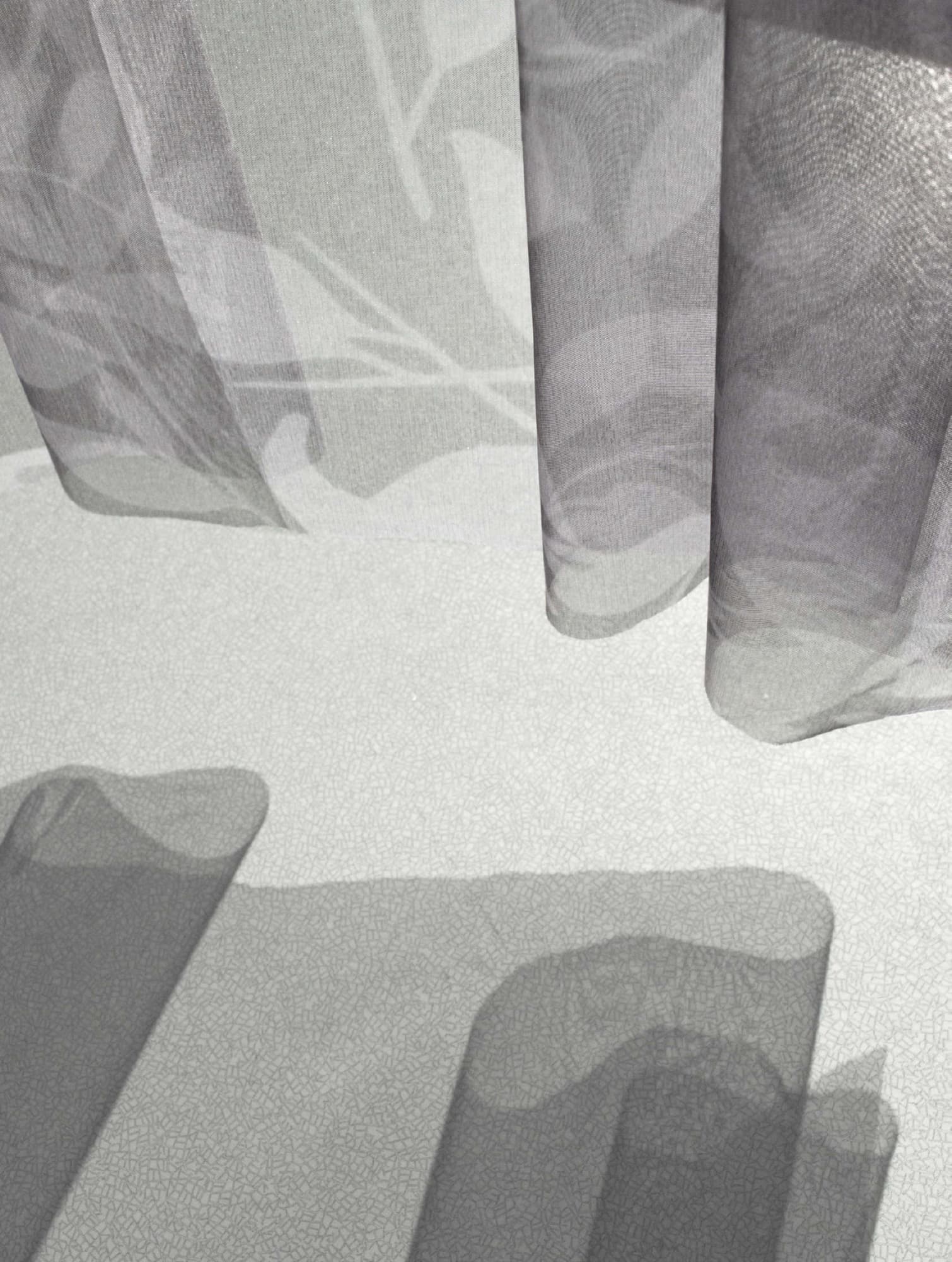 Close-up of layered sheer grey woven textile