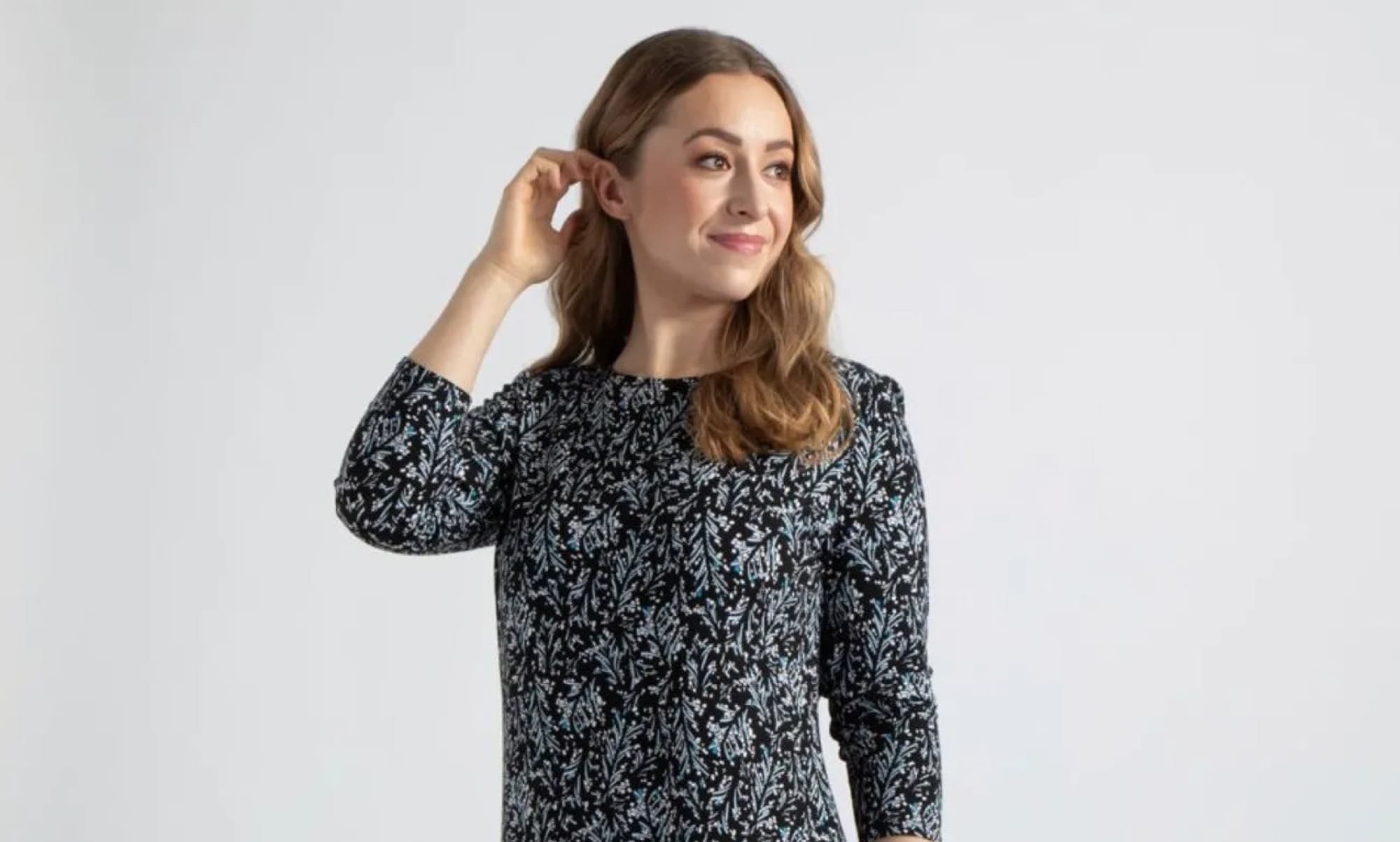 Model wearing an Impression pattern dress for Prisma